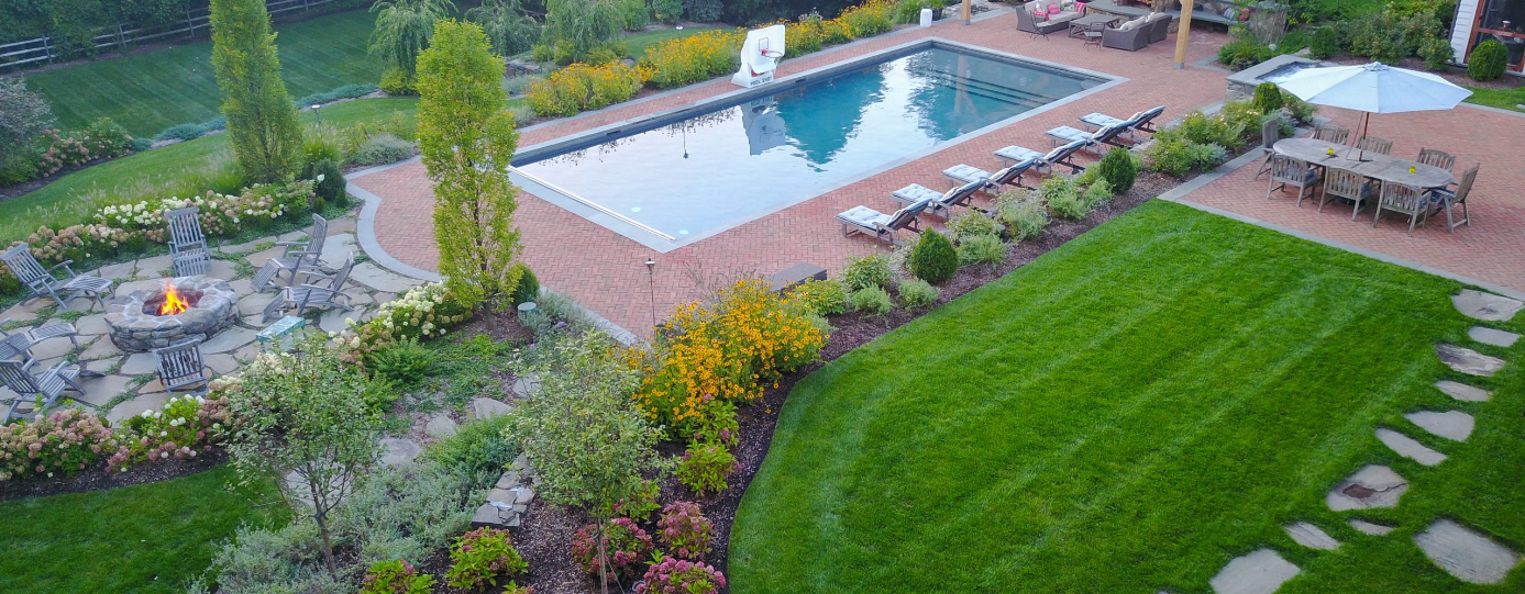 outdoor living space and backyard trends, pool design trends 2023 and 2024