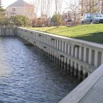 How to Decide Between Bulkhead vs. Seawall for Your Waterfront Property